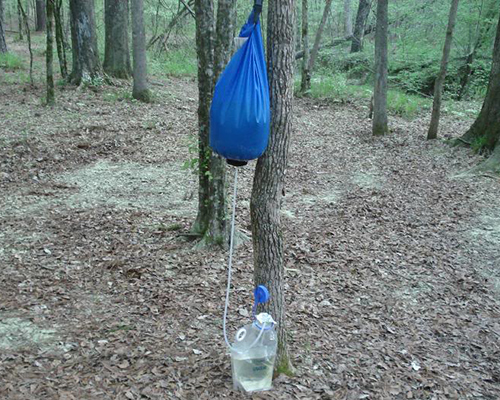 Gravity water filter backpacking or gravity bag water filter دستگاه تصفیه آب جاذبه‌ای کوله پشتی